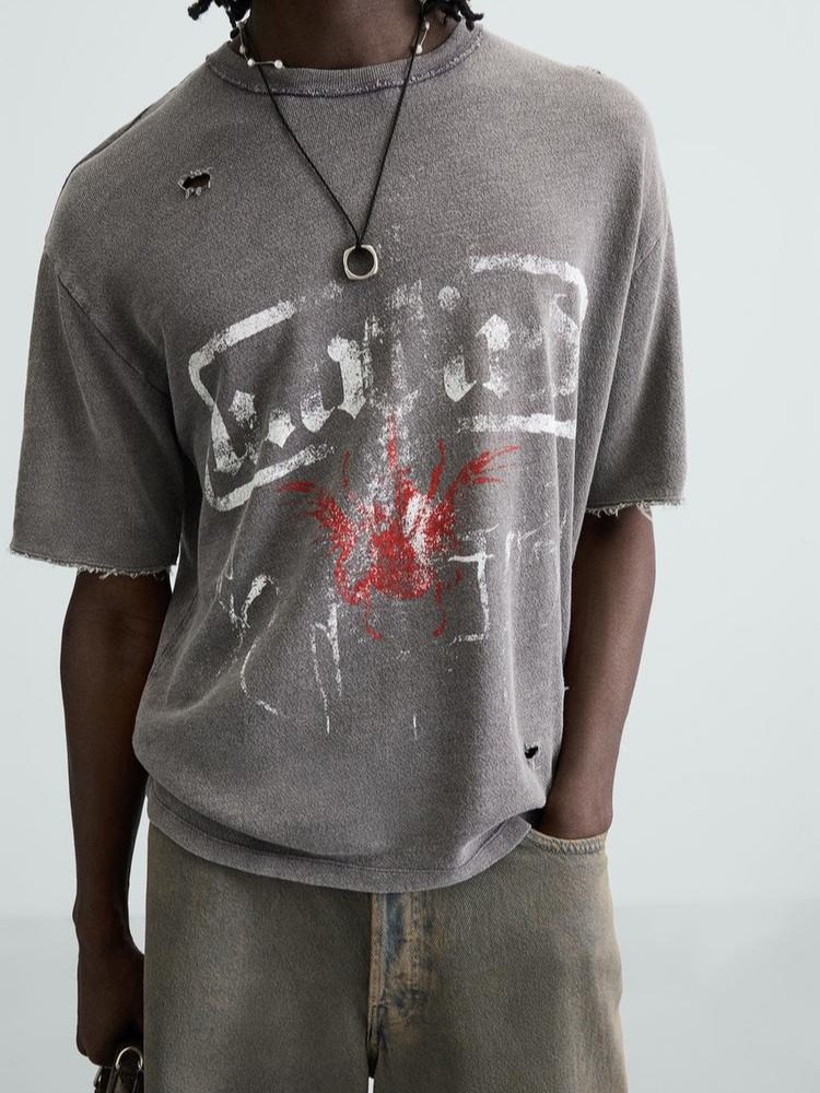 CAMISETA PUNTO ESTAMPADO LAVADO ROTO