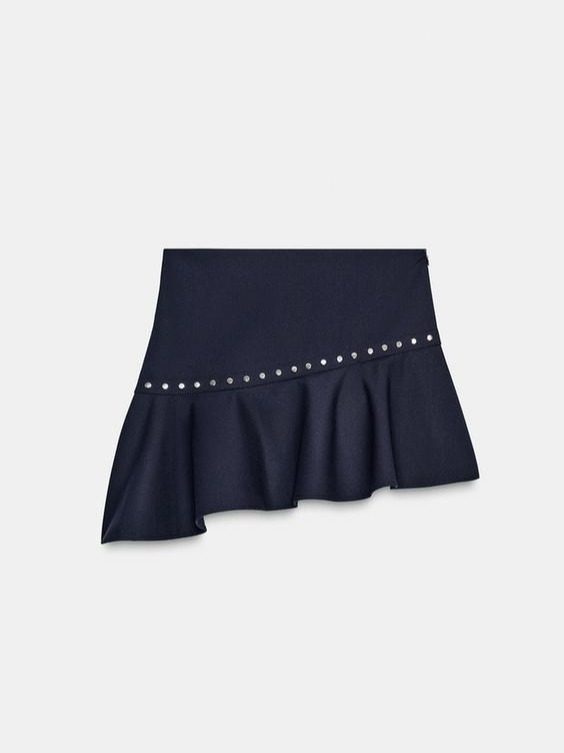 FALDA ASIMÉTRICA VOLANTE TACHAS