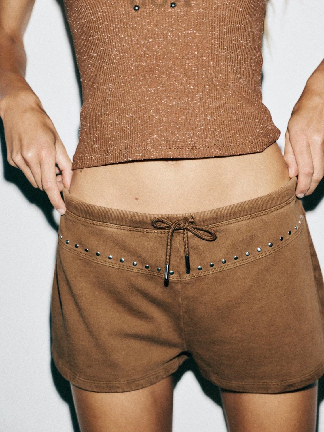 SHORTS EFECTO LAVADO TACHAS