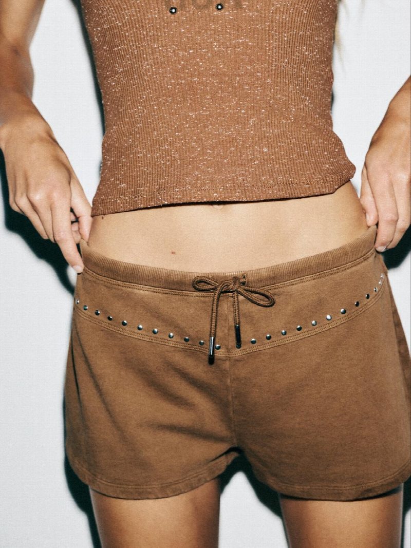 SHORTS EFECTO LAVADO TACHAS